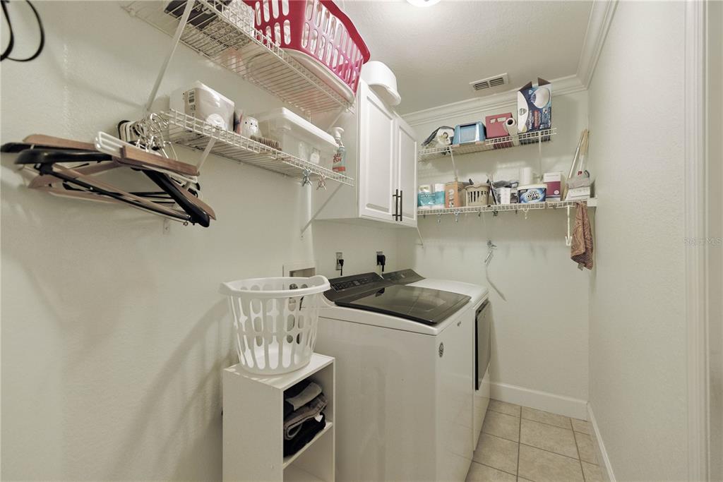 5968 Southwest 103rd Loop Ocala, FL 34476 - Photo 15 of 48 a kitchen with a sink and cabinets