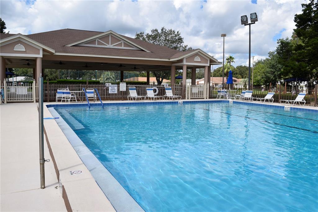 5968 Southwest 103rd Loop Ocala, FL 34476 - Photo 32 of 48 a view of a swimming pool with a patio
