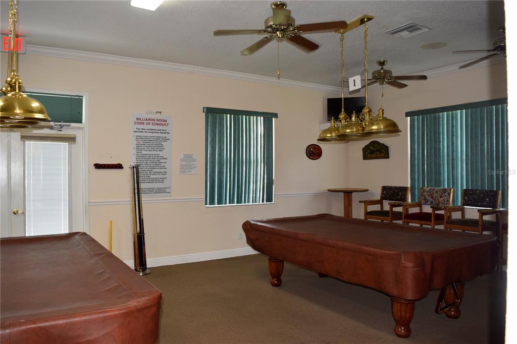 5968 Southwest 103rd Loop Ocala, FL 34476 - Photo 36 of 48 a living room with furniture and a window