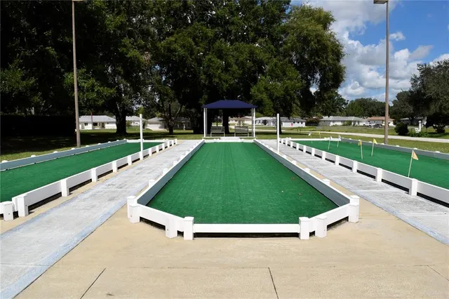 a view of a big yard next to a house