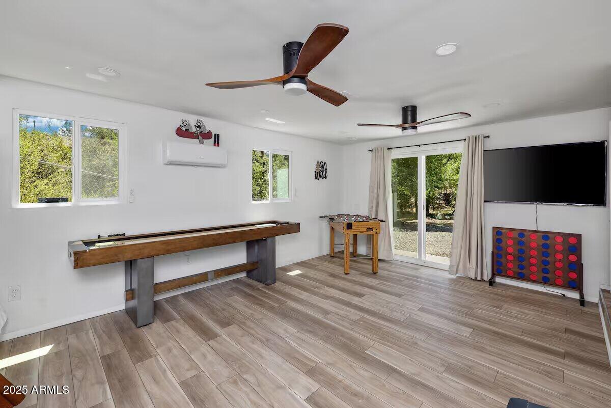 1822 Idylwild Road Prescott, AZ 86305 - Photo 12 of 25 a reading room with furniture and a flat screen tv