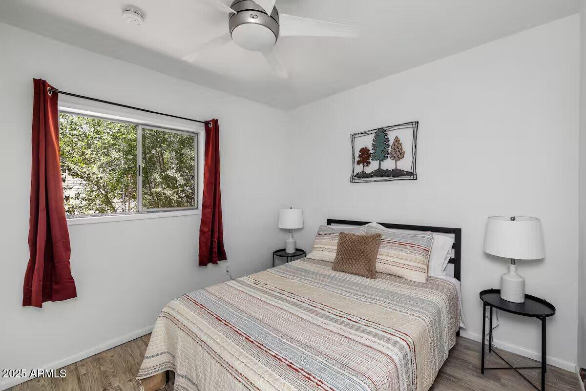 1822 Idylwild Road Prescott, AZ 86305 - Photo 5 of 25 a bedroom with a bed and a window