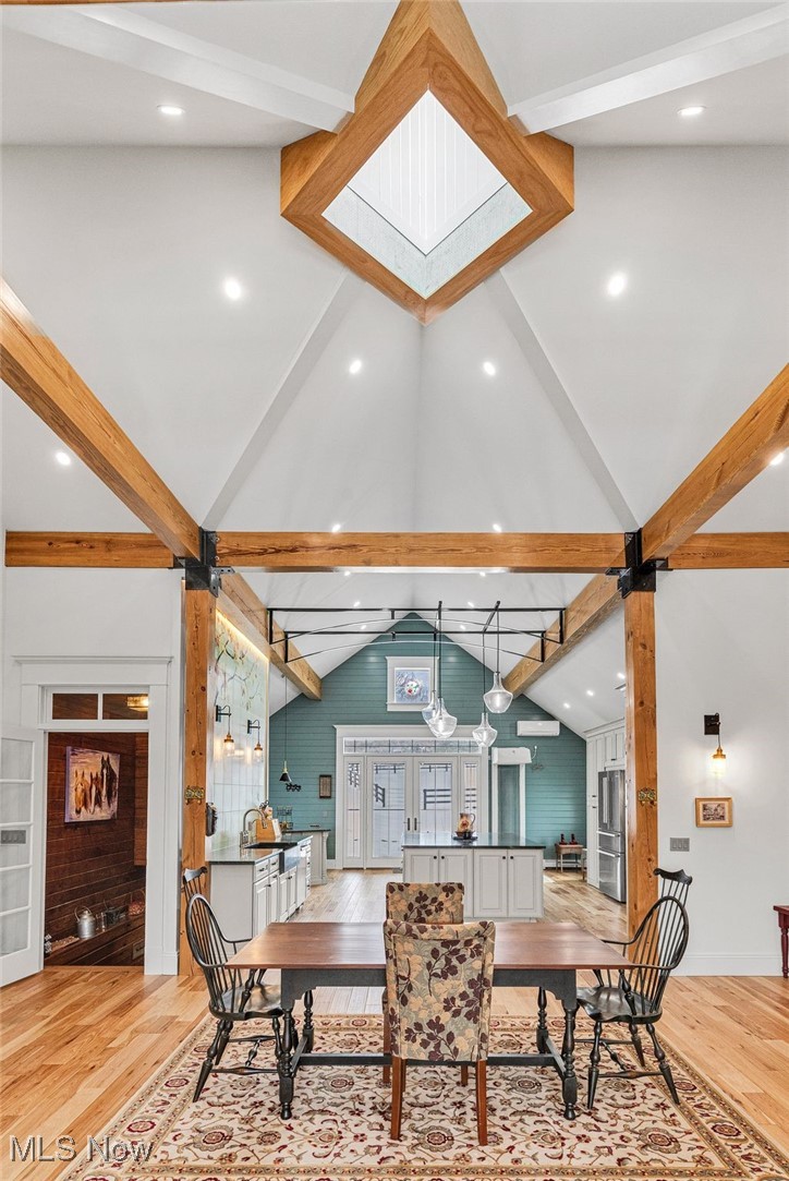 8830 Mentor Road Mentor, OH 44060 - Photo 14 of 50 dining area w/ skylight & True 16x8 Timber beams