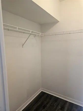 a view of a room with racks on the wall