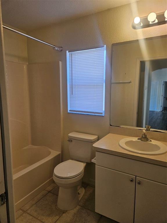 4138 Azora Street North Port, FL 34291 - Photo 33 of 37 a bathroom with a sink a toilet and shower