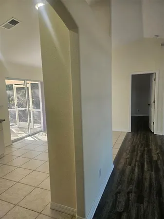 a view of a closet area with empty racks