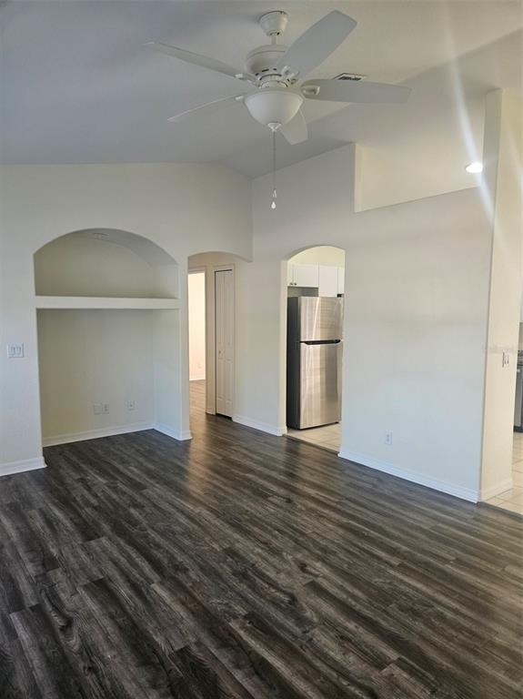 4138 Azora Street North Port, FL 34291 - Photo 10 of 37 an empty room with wooden floor closet and windows