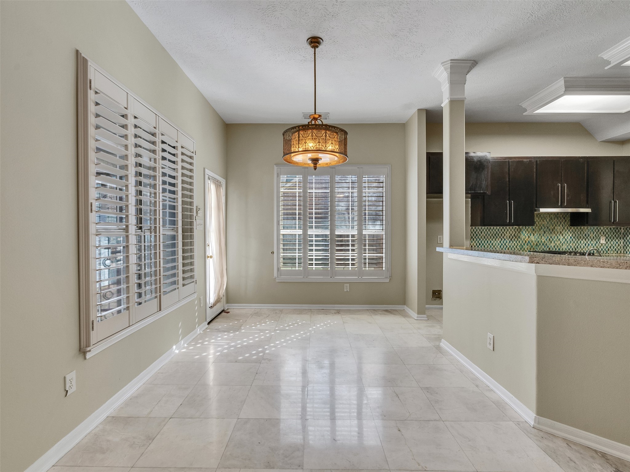 4414 Santee Drive Baytown, TX 77521 - Photo 15 of 50 a view of a kitchen with a sink cabinet and a window