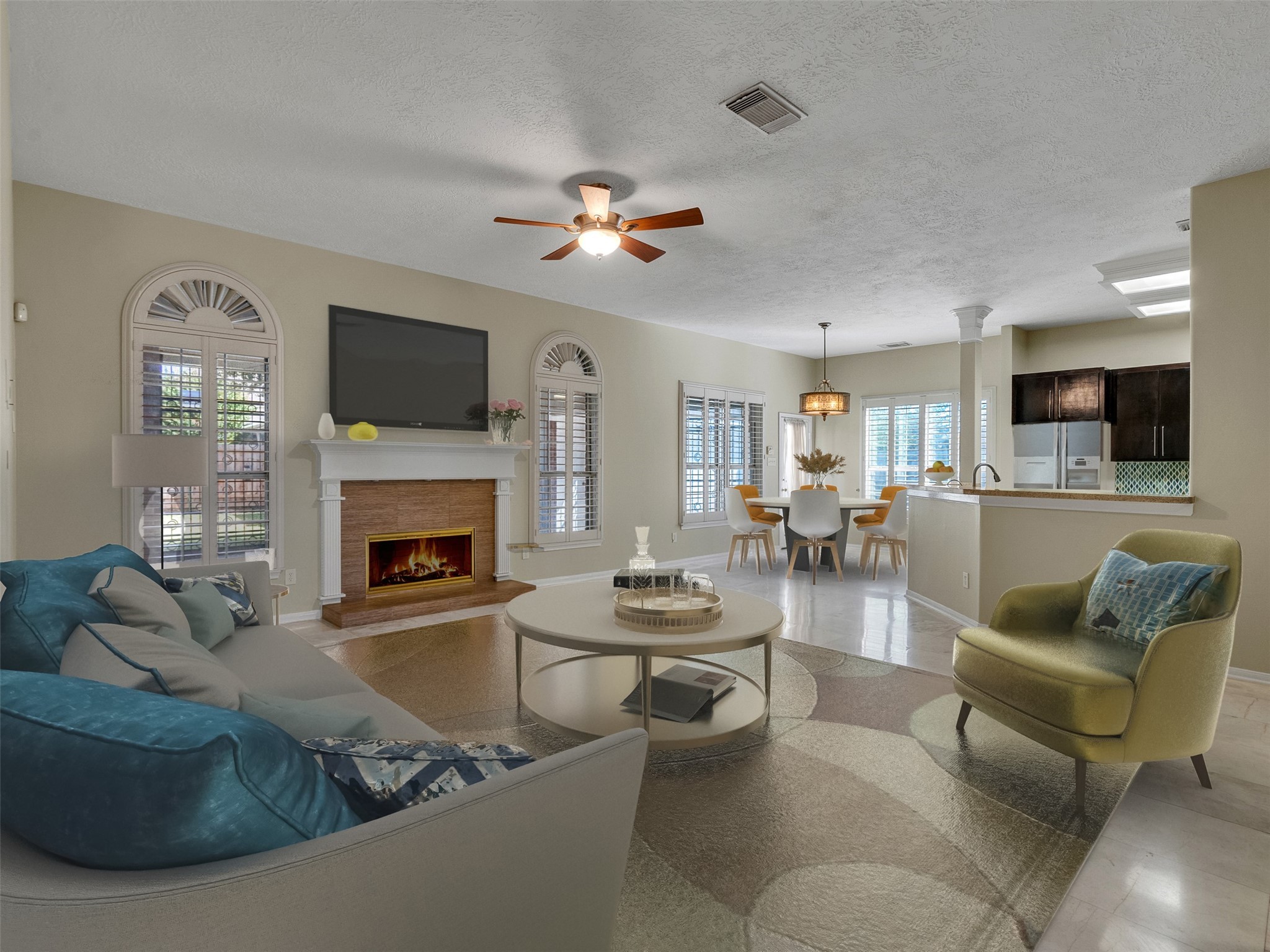 4414 Santee Drive Baytown, TX 77521 - Photo 19 of 50 a living room with furniture a fireplace and a flat screen tv