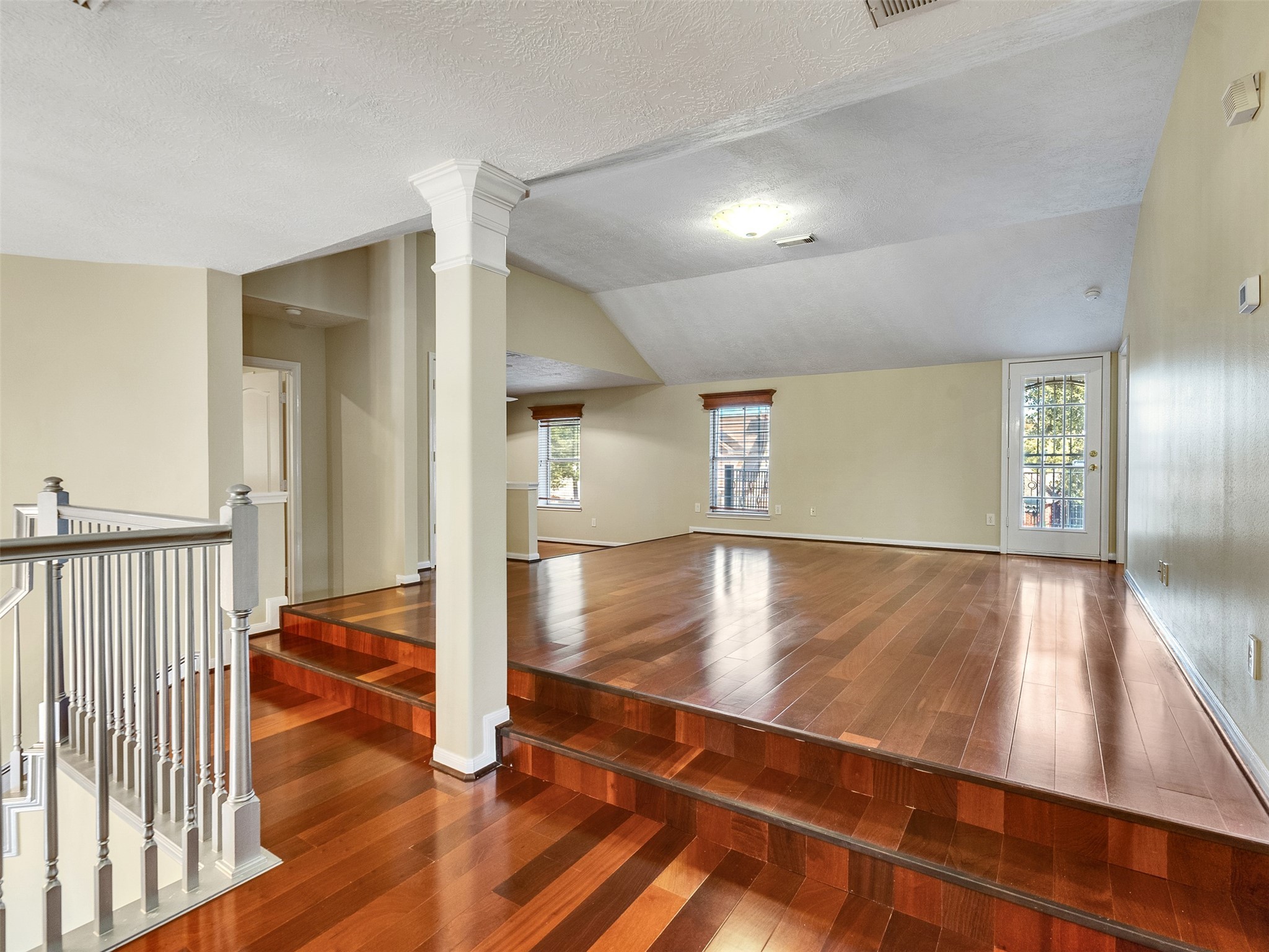 4414 Santee Drive Baytown, TX 77521 - Photo 27 of 50 a view of a hallway with wooden floor