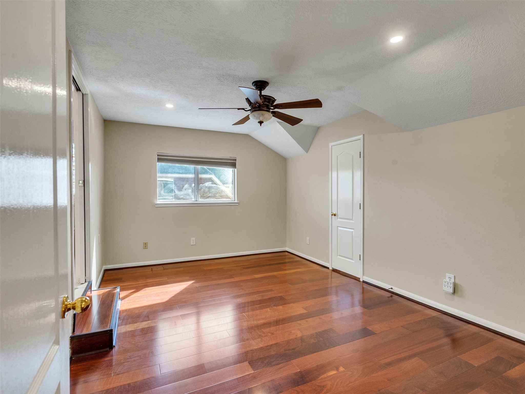 4414 Santee Drive Baytown, TX 77521 - Photo 32 of 50 wooden floor in an empty room with a window