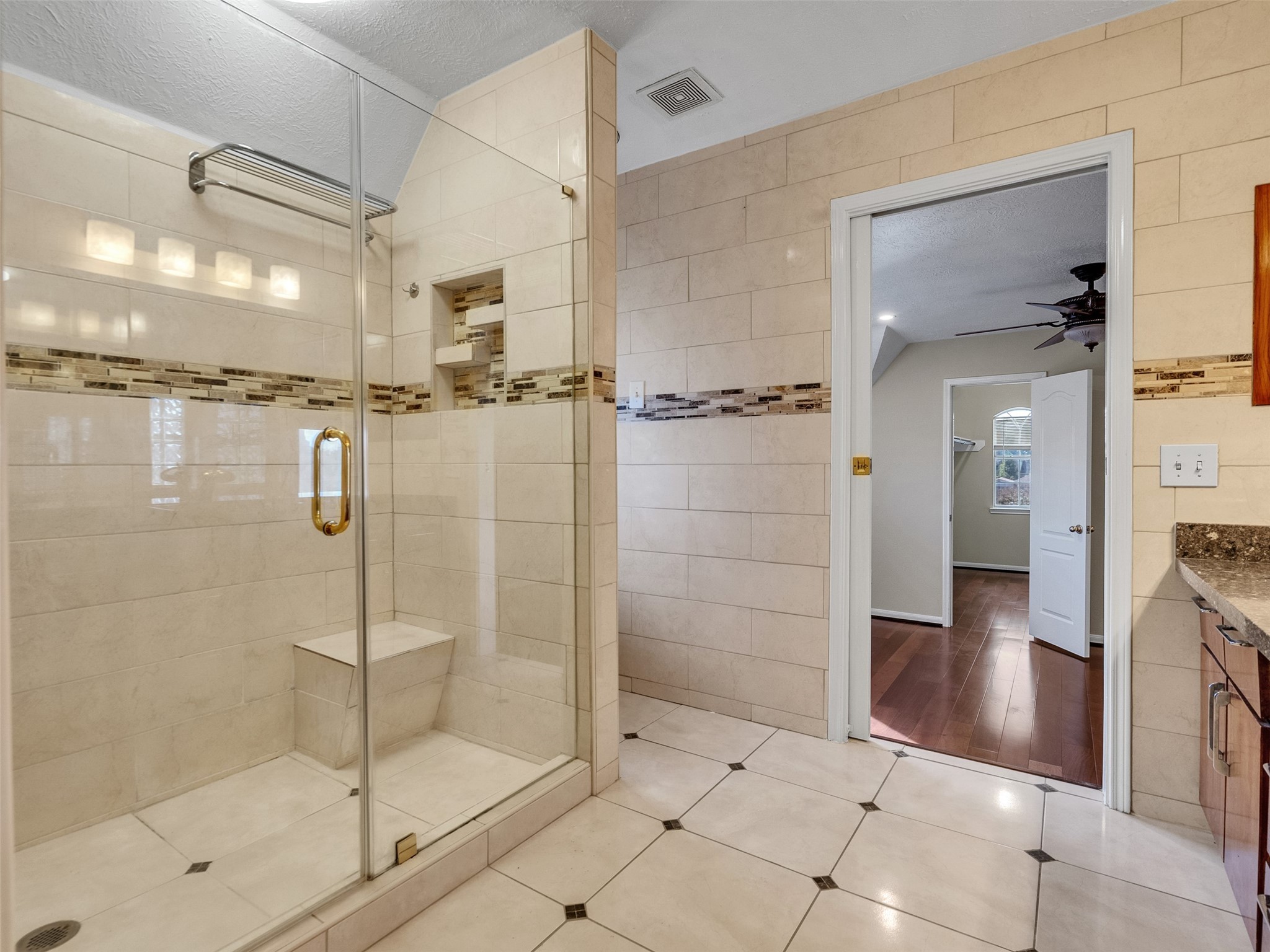 4414 Santee Drive Baytown, TX 77521 - Photo 35 of 50 a bathroom with a glass shower door