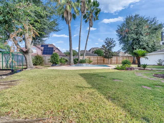 a view of outdoor space yard and swimming pool