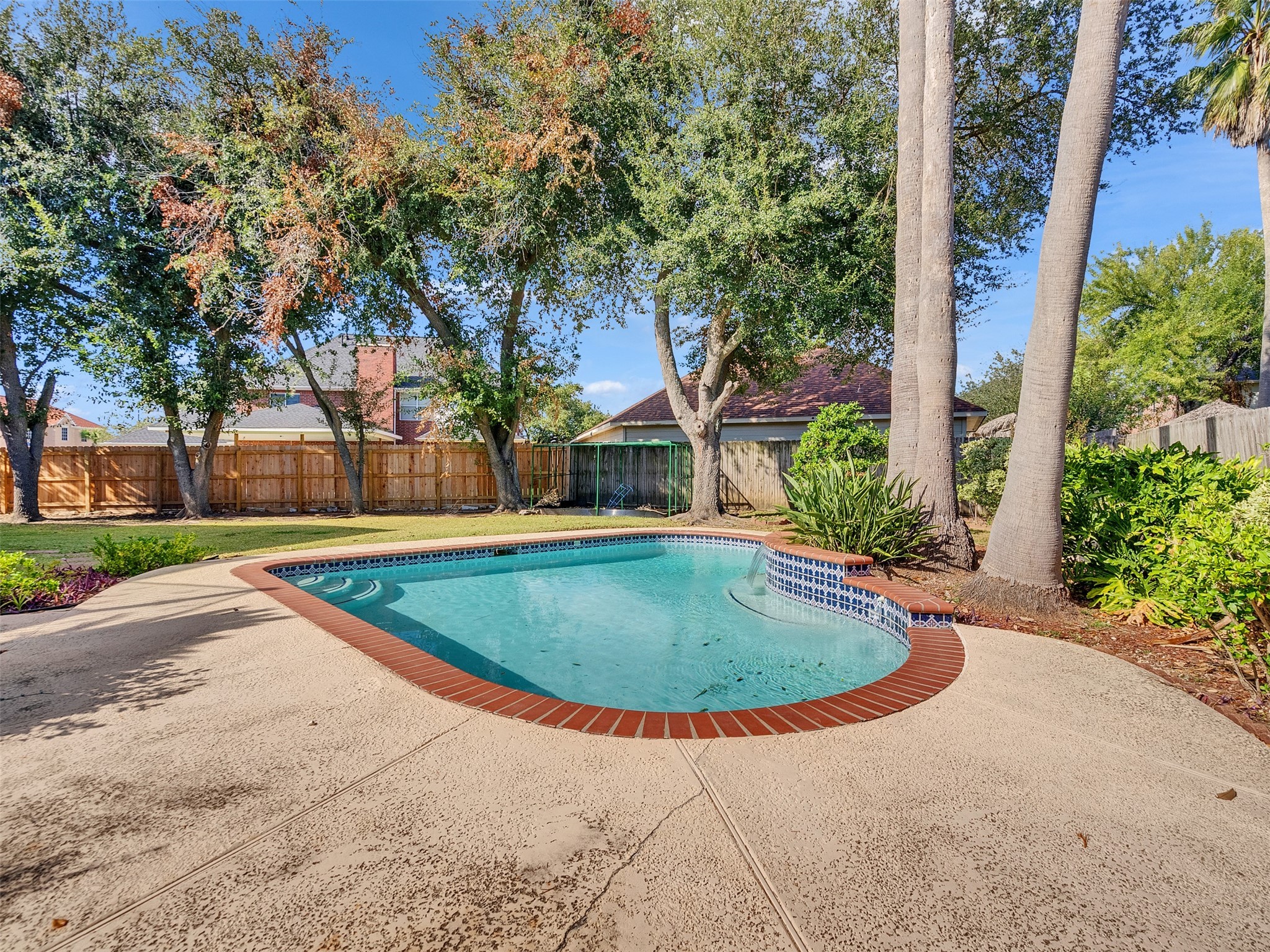 4414 Santee Drive Baytown, TX 77521 - Photo 46 of 50 a view of outdoor space yard and swimming pool