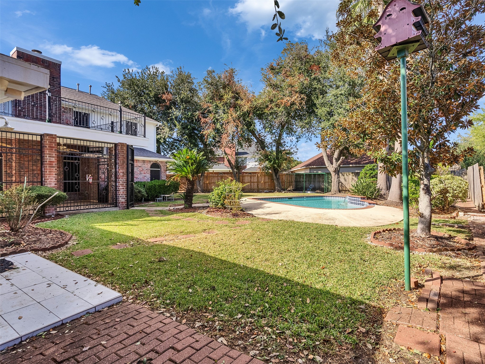 4414 Santee Drive Baytown, TX 77521 - Photo 47 of 50 a view of outdoor space yard and swimming pool