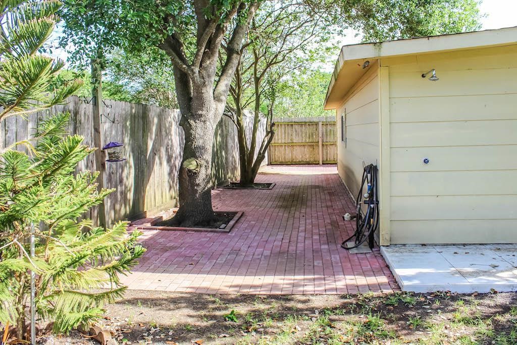 4414 Santee Drive Baytown, TX 77521 - Photo 49 of 50 a view of backyard with wooden fence