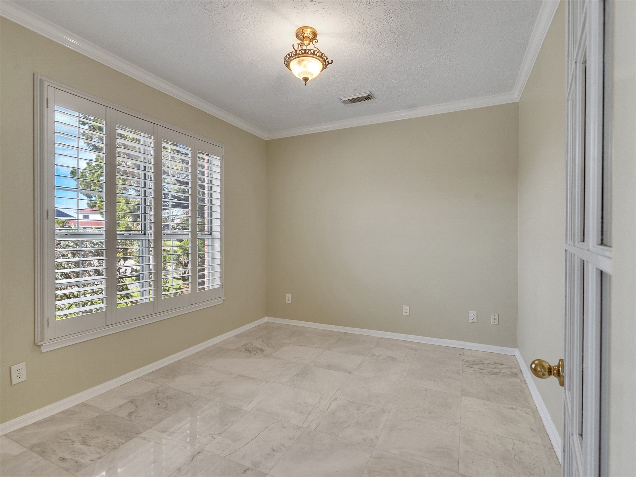 4414 Santee Drive Baytown, TX 77521 - Photo 6 of 50 a view of an empty room with a window