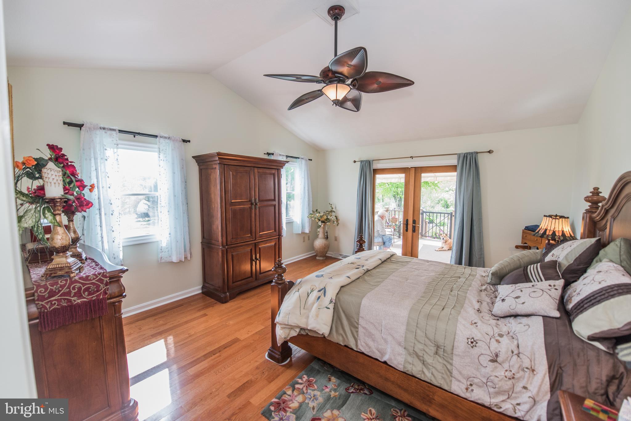 358 Ridge View Drive Berkeley Springs, WV 25411 - Photo 12 of 50 lots of light in master bedroom with new windows