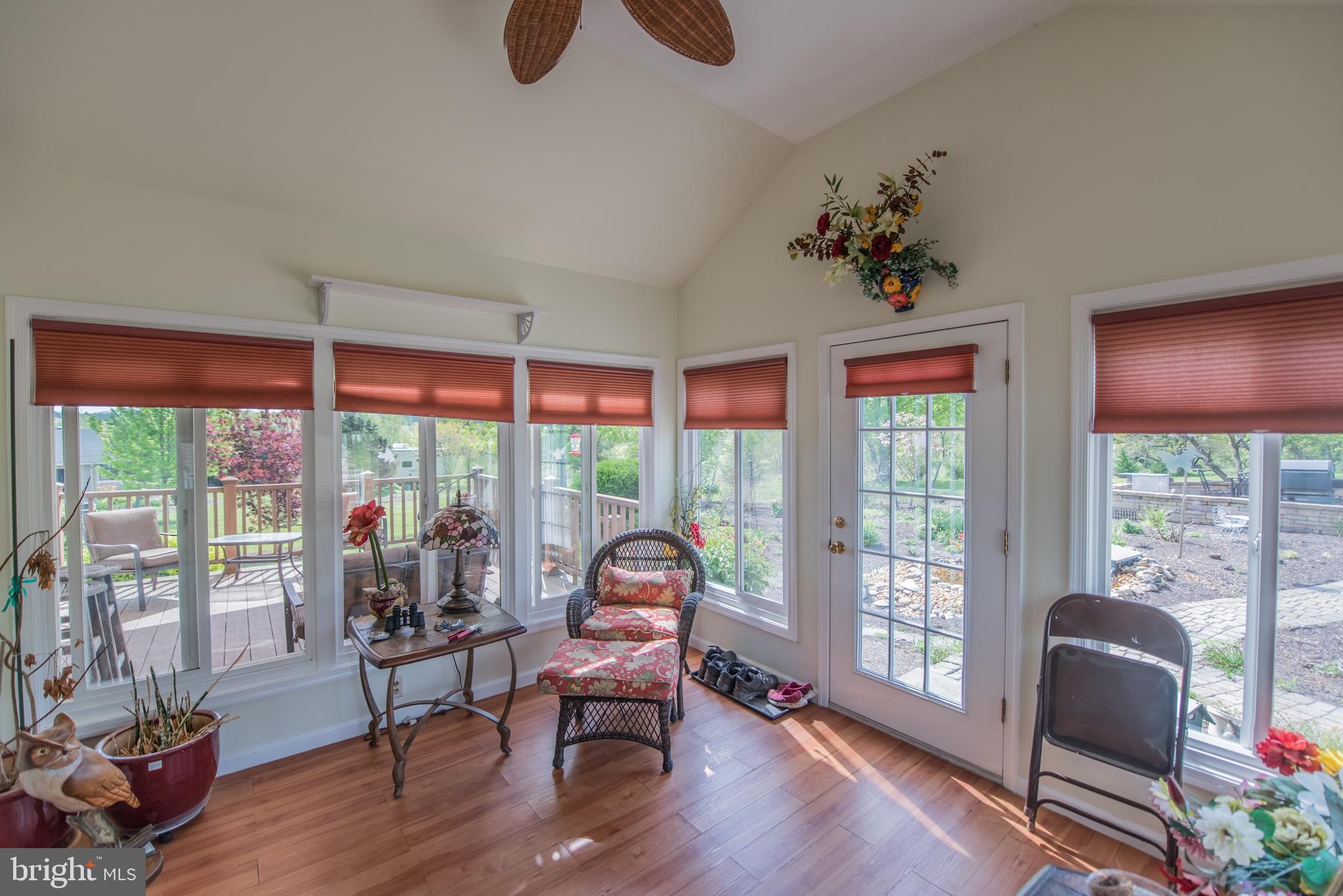 358 Ridge View Drive Berkeley Springs, WV 25411 - Photo 23 of 50 Sun Room with custom blinds