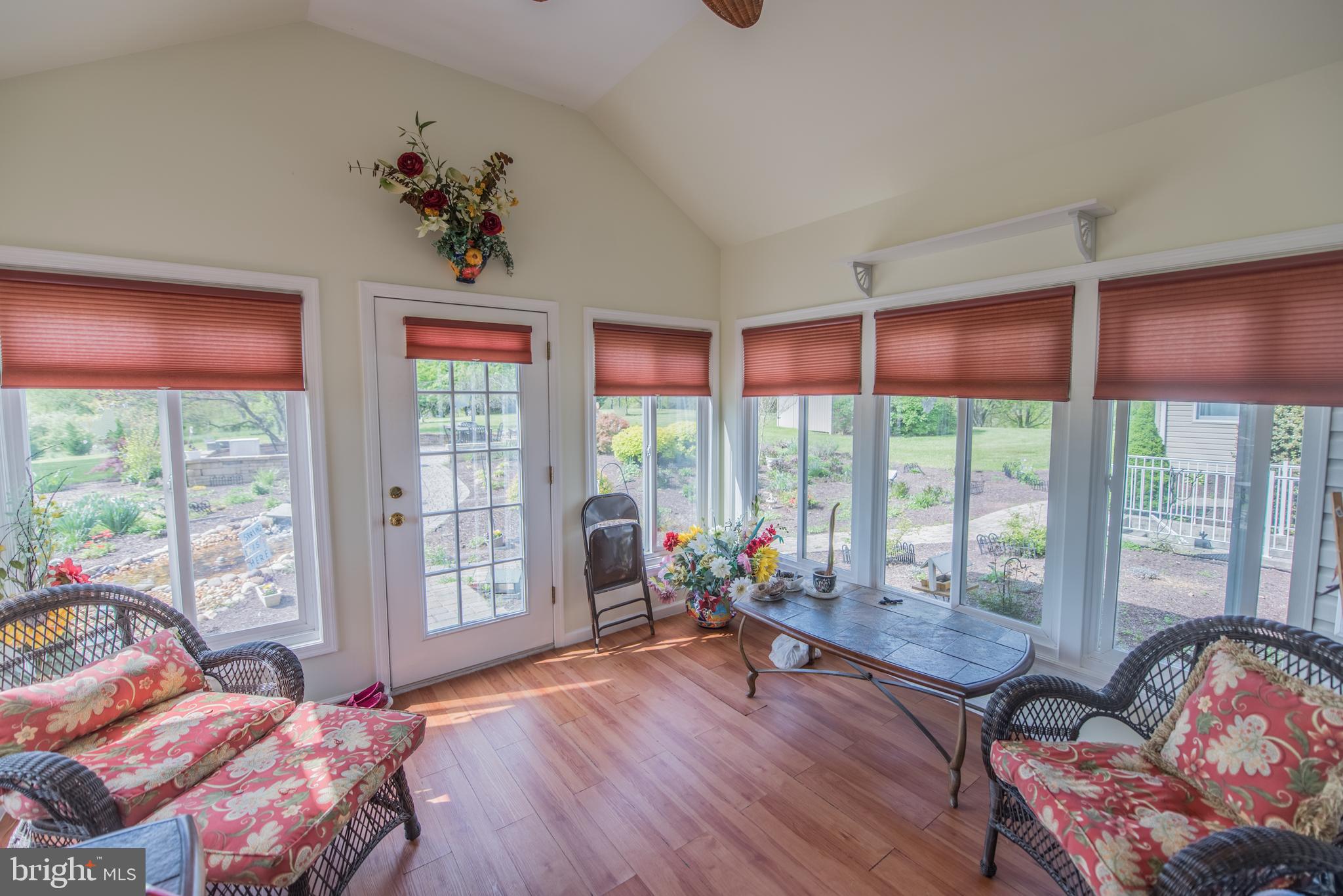 358 Ridge View Drive Berkeley Springs, WV 25411 - Photo 4 of 50 sun room with with custom blinds