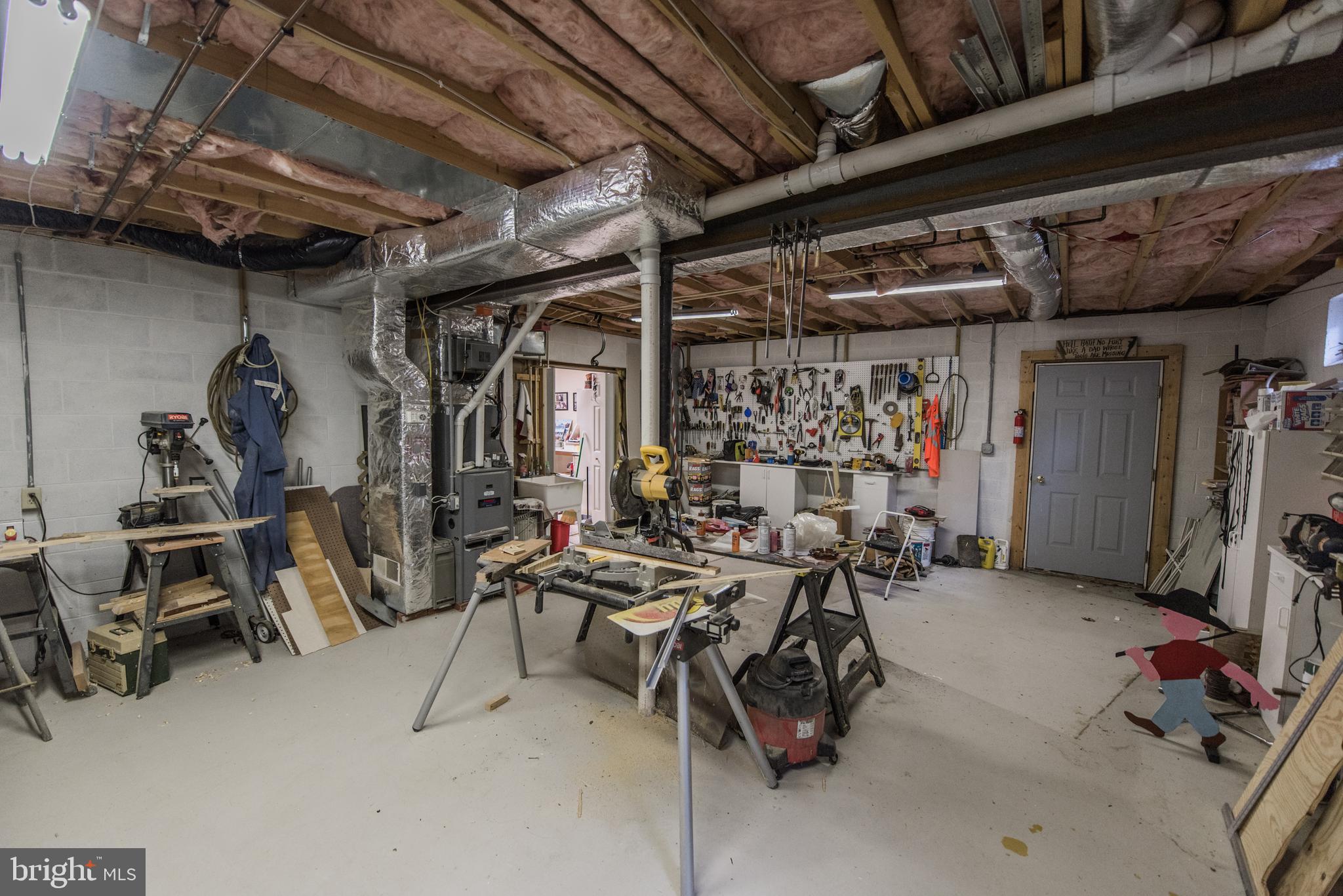 358 Ridge View Drive Berkeley Springs, WV 25411 - Photo 46 of 50 basement level workshop