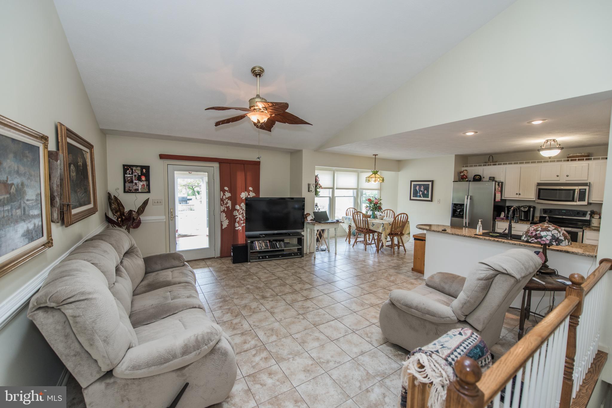 358 Ridge View Drive Berkeley Springs, WV 25411 - Photo 49 of 50 Family room with ceramic tile