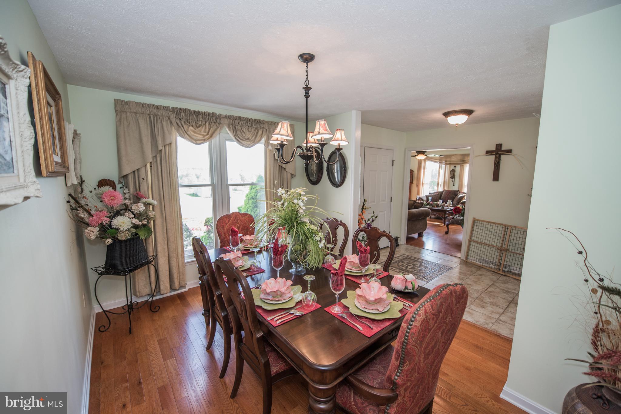 358 Ridge View Drive Berkeley Springs, WV 25411 - Photo 6 of 50 formal dining room with wood floors