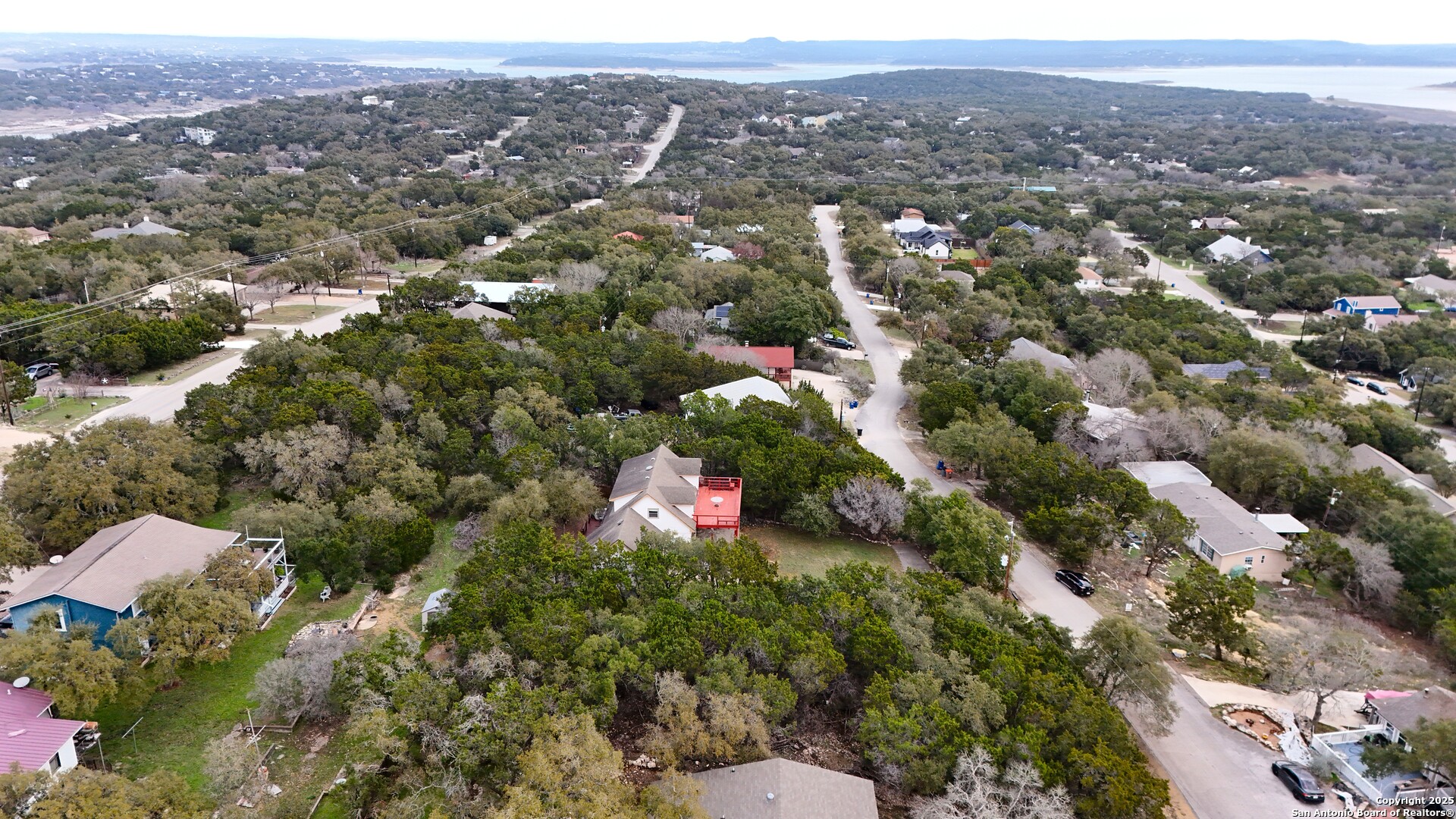 1237 Springwater Canyon Lake, TX 78133 - Photo 3 of 5 an aerial view of multiple house