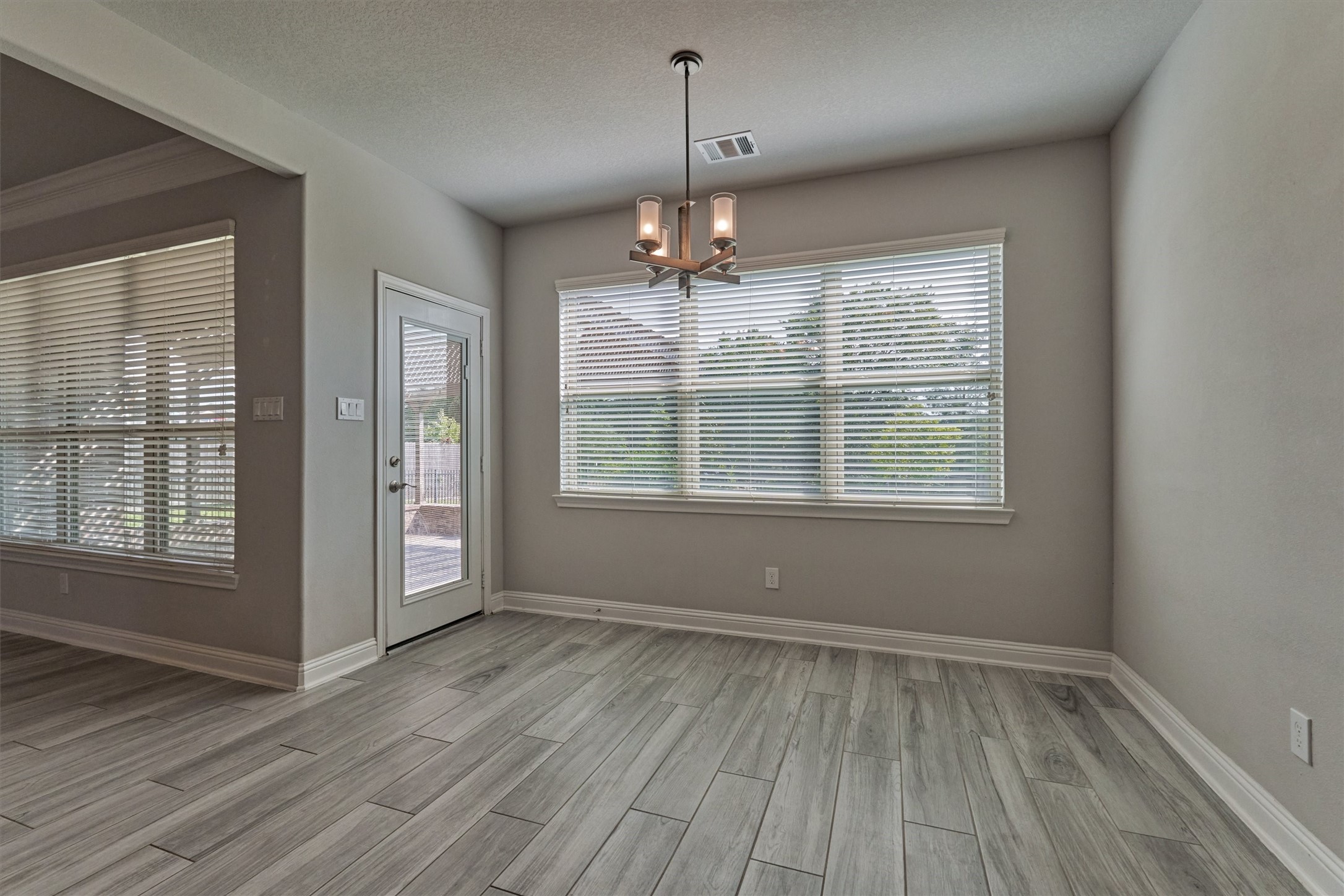 180 Racetrack Lane Montgomery, TX 77356 - Photo 20 of 46 Dining area overlooking the back yard.