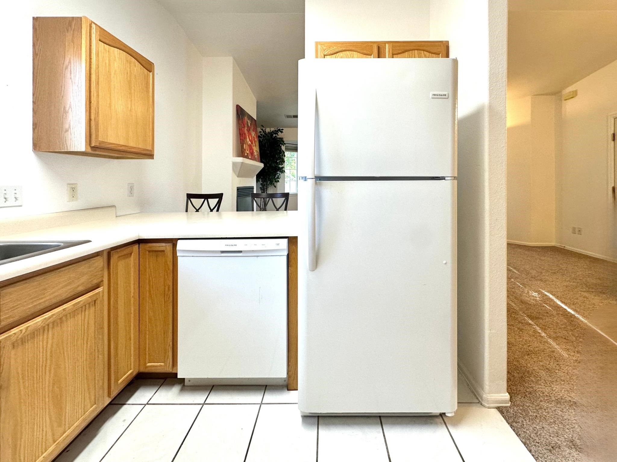 656 Springbrook Drive Grand Junction, CO 81504 - Photo 12 of 32 a utility room with cabinets washer and dryer