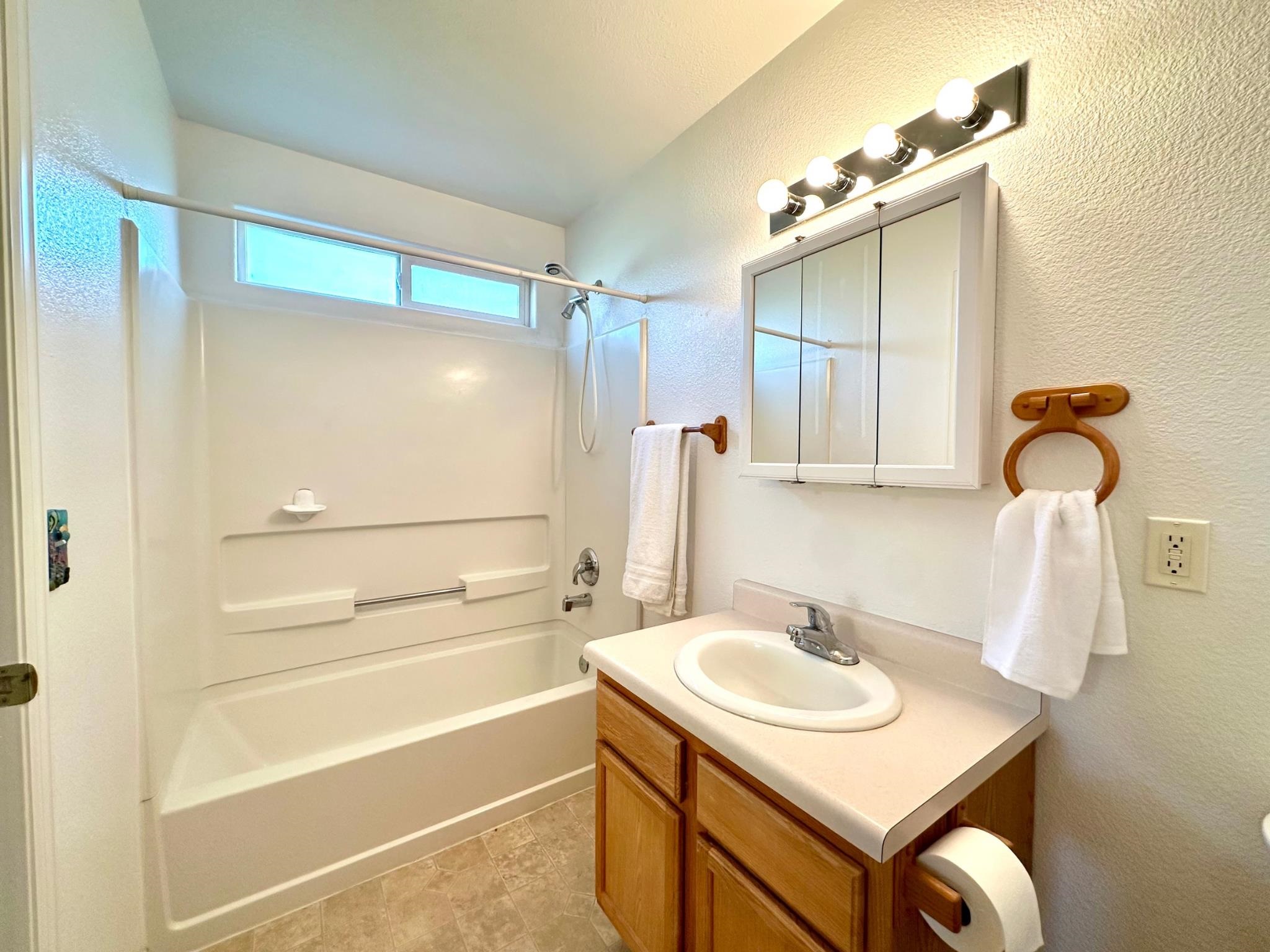 656 Springbrook Drive Grand Junction, CO 81504 - Photo 17 of 32 a bathroom with a sink and a mirror