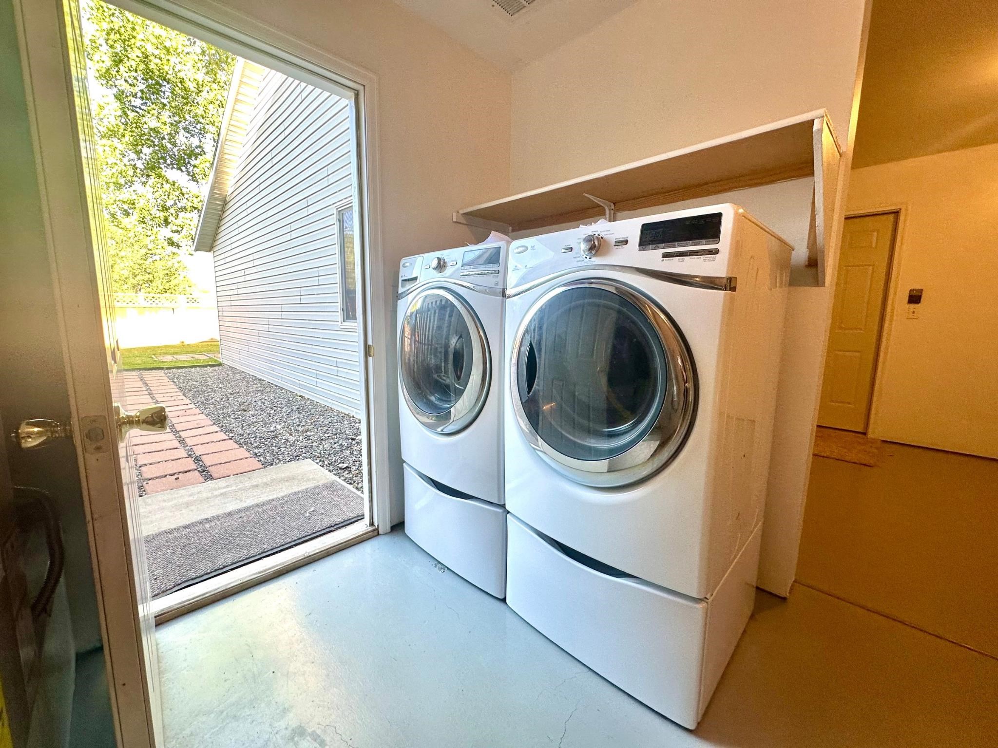 656 Springbrook Drive Grand Junction, CO 81504 - Photo 25 of 32 a utility room with dryer and washer