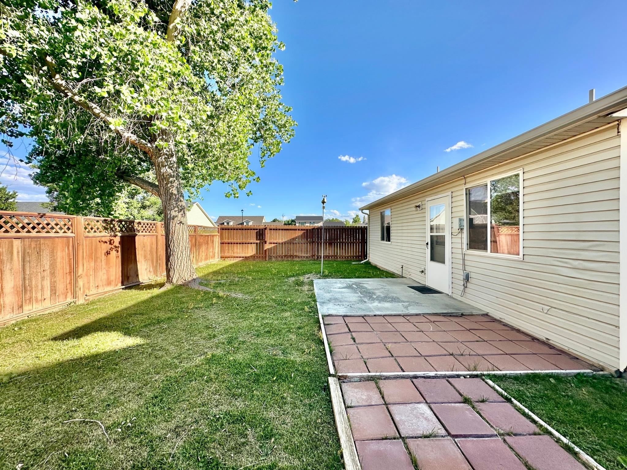 656 Springbrook Drive Grand Junction, CO 81504 - Photo 26 of 32 a view of a backyard of the house