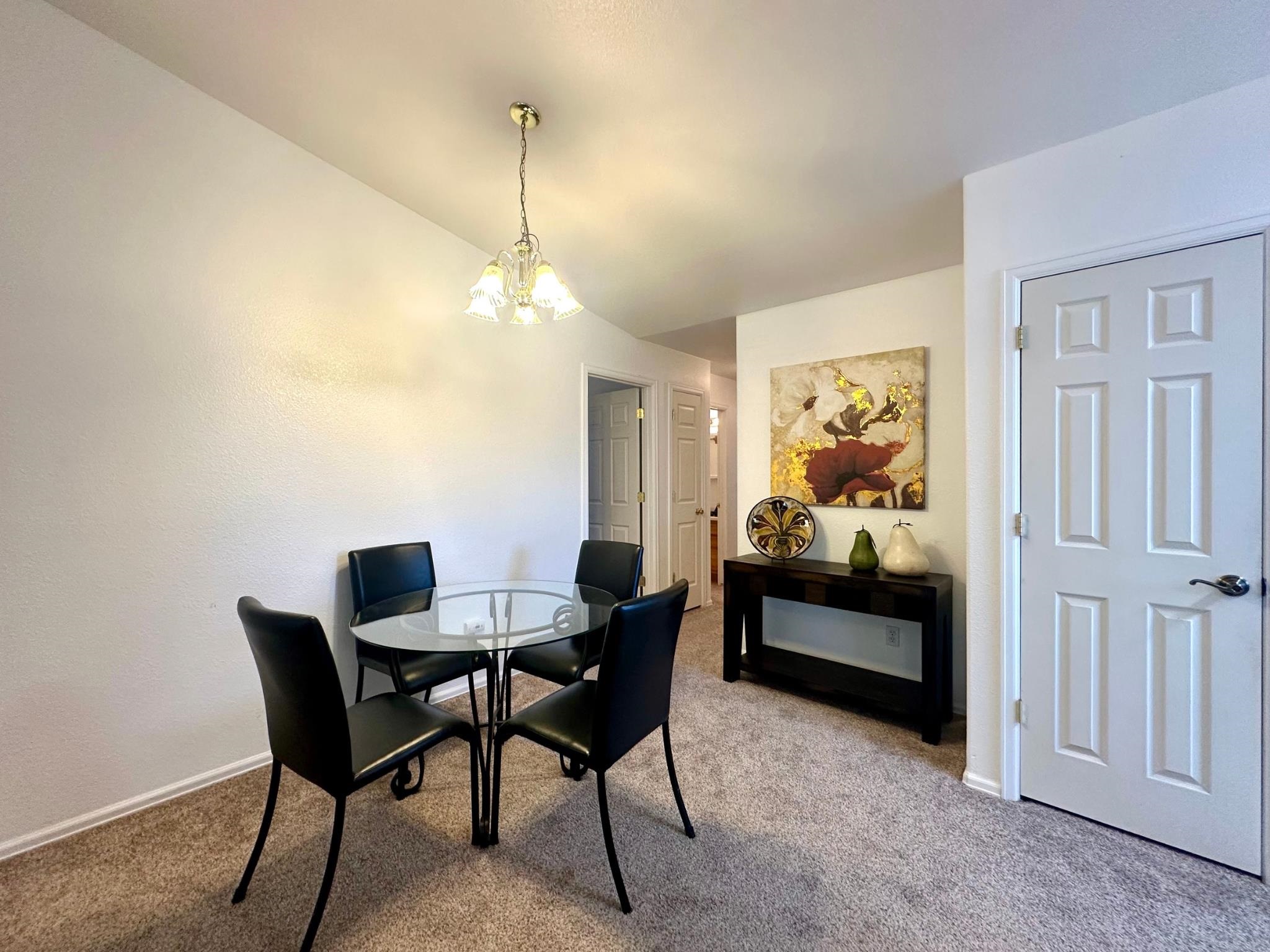 656 Springbrook Drive Grand Junction, CO 81504 - Photo 9 of 32 a view of a livingroom with furniture and window