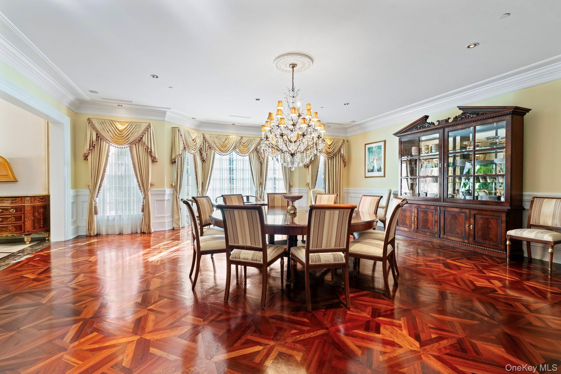 660 Chicken Valley Road Locust Valley, NY 11560 - Photo 12 of 48 a view of a dining room with furniture window and wooden floor
