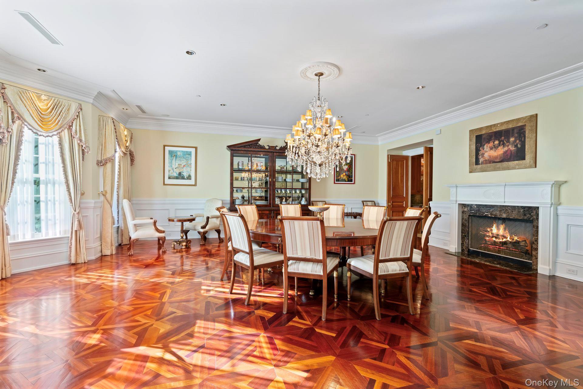 660 Chicken Valley Road Locust Valley, NY 11560 - Photo 13 of 48 a view of a dining room with furniture window and wooden floor