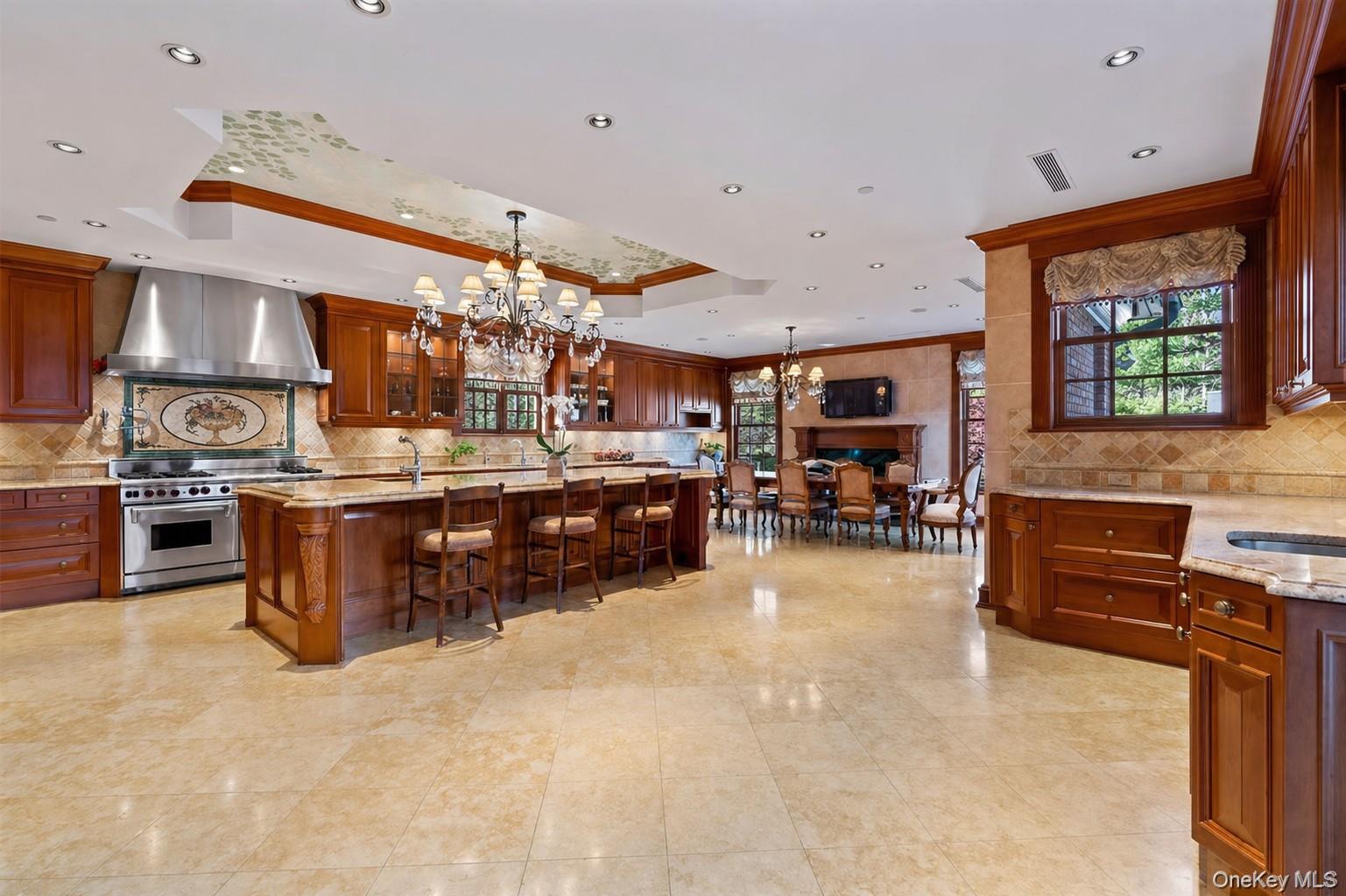 660 Chicken Valley Road Locust Valley, NY 11560 - Photo 25 of 48 a view of a kitchen and dining area