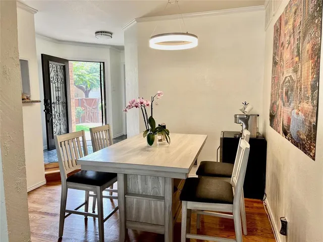 a kitchen with stainless steel appliances granite countertop a stove microwave and refrigerator