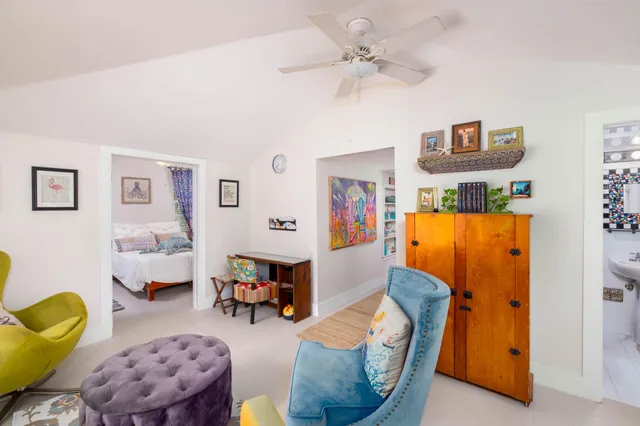 a bedroom with furniture and a bed