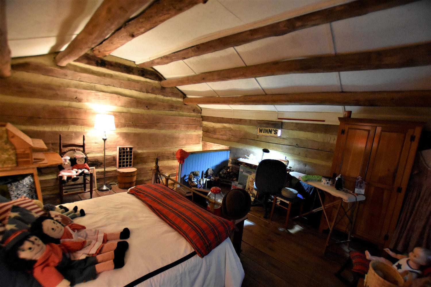821 Sand Hill Road Irvine, KY 40336 - Photo 56 of 78 The logs and ceiling beams date back to