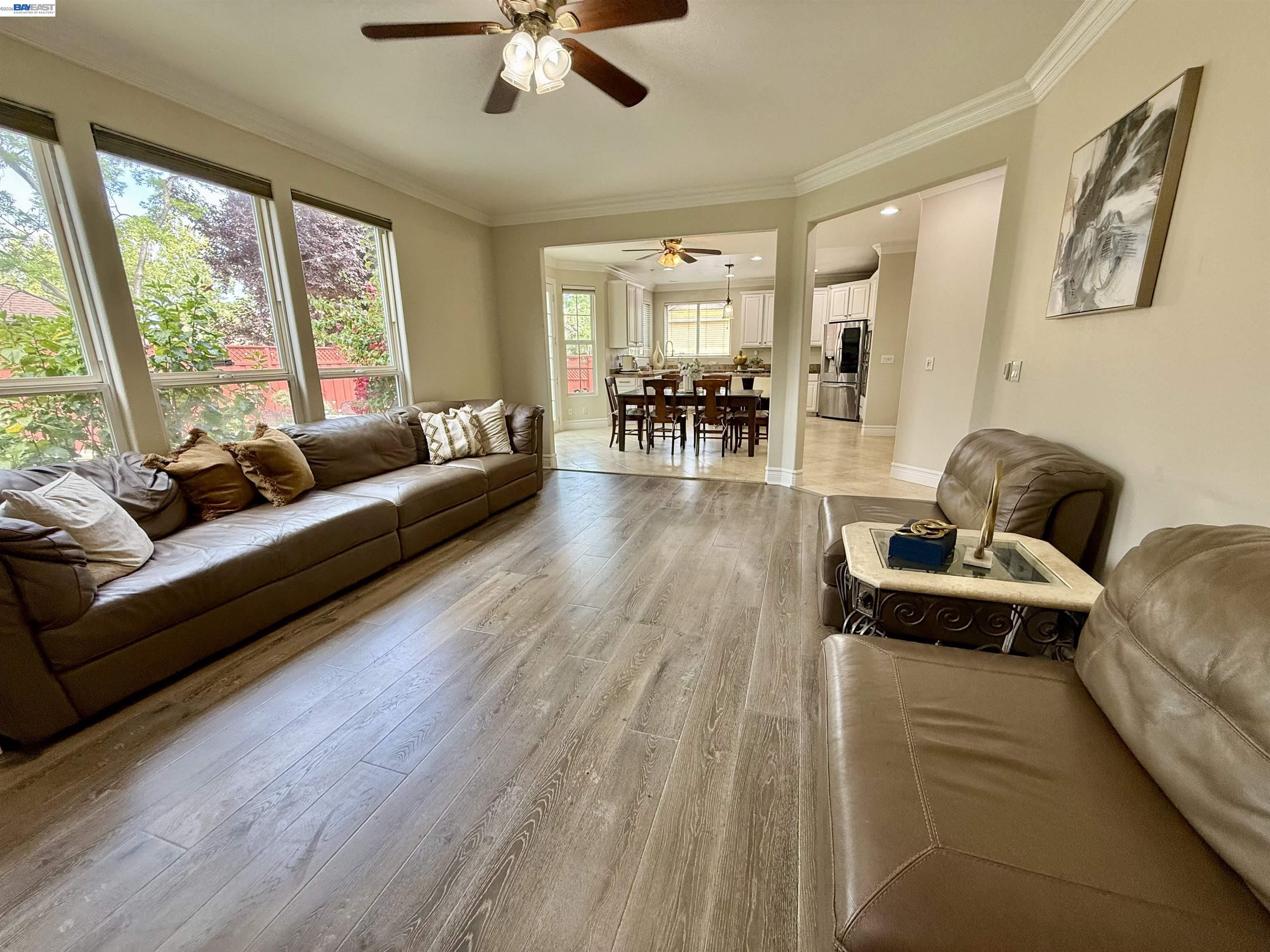 1284 Riesling Circle Livermore, CA 94550 - Photo 31 of 79 a living room with furniture and wooden floor