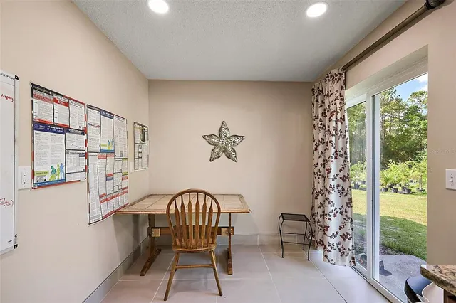 a view of a garage with a bike and car