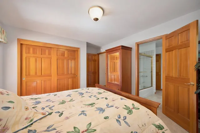 a spacious bathroom with a double vanity sink mirror and double