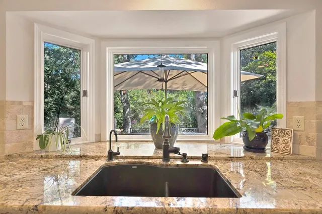 a view of a living room and dining room