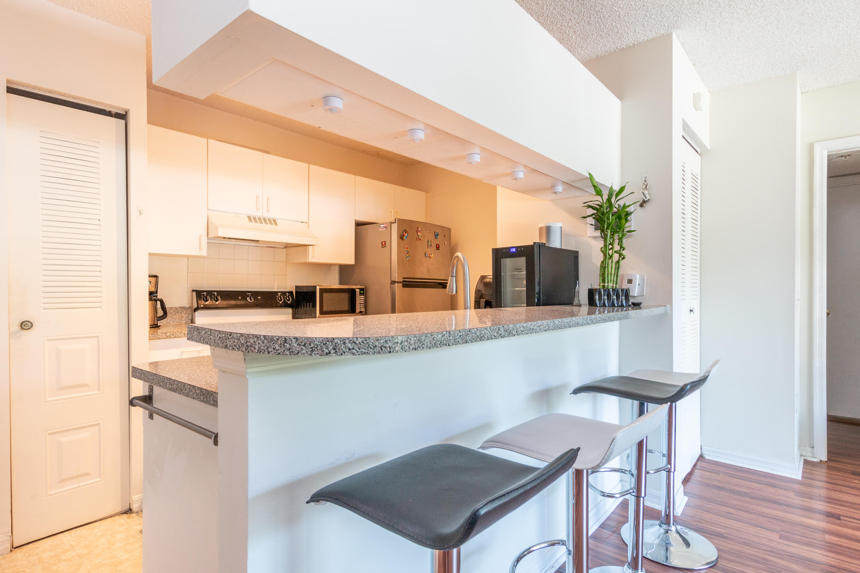 460 South Park Road, Unit 110 Hollywood, FL 33021 - Photo 1 of 17 a kitchen with a counter space a sink and cabinets