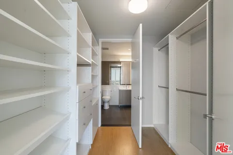 a bathroom with a tub and shower