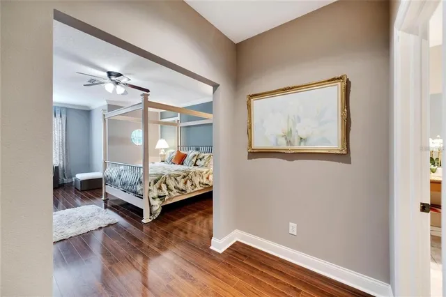 a bedroom with bed and window