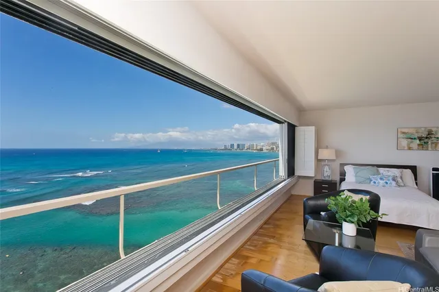 a view of swimming pool with seating space