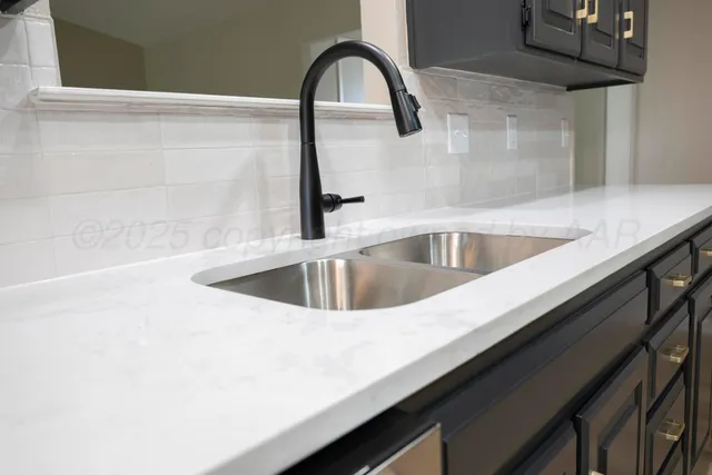 a close view of a sink and tap