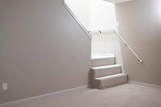 a hallway with stairs